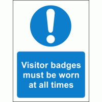 Visitor badges must be worn at all times sign