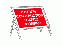 Caution construction traffic crossing...