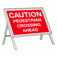 Caution pedestrians crossing ahead sign