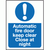 Automatic fire door keep clear close at night sign 