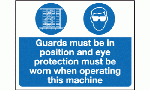 Guards must be in position and eye protection must be worn when operating this machine sign