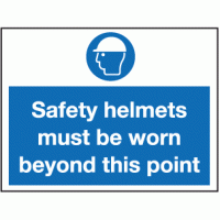Safety helmets must be worn beyond this point sign