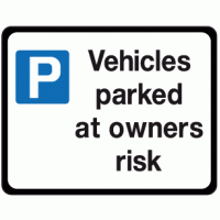 Vehicles parked at owners risk sign