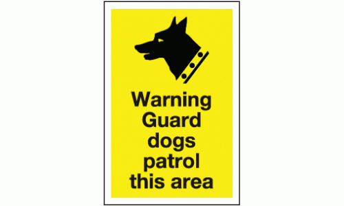 Warning guard dogs patrol this area sign