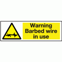 Warning barbed wire in use sign