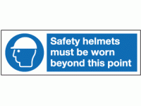 Safety helmets must be worn beyond th...