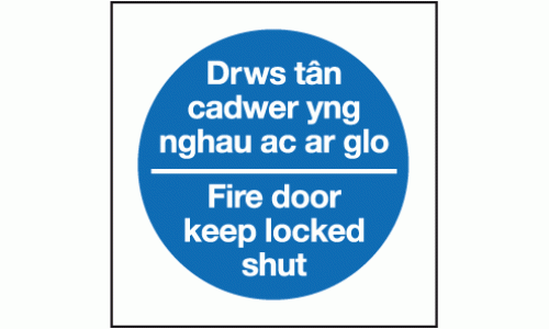 Drws tan cadwer yng nghau ac ar glo - fire door keep locked shut sign