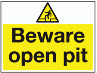 Beware open pit sign