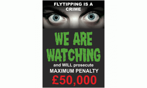Fly tipping is a crime we are watching and will prosecute sign