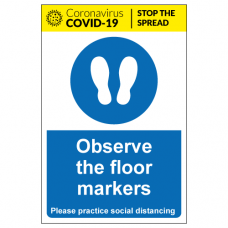 Observe the floor markers social distancing sign